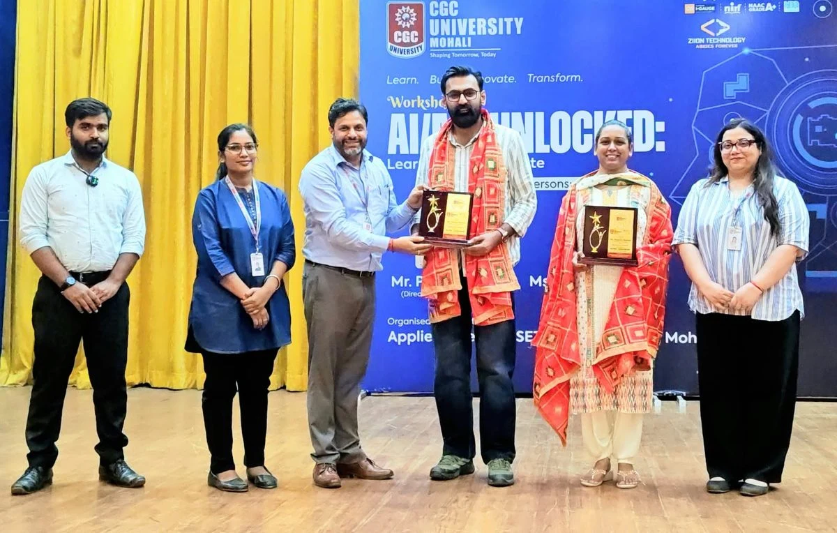 Ziion team receiving recognition at a CGC University workshop